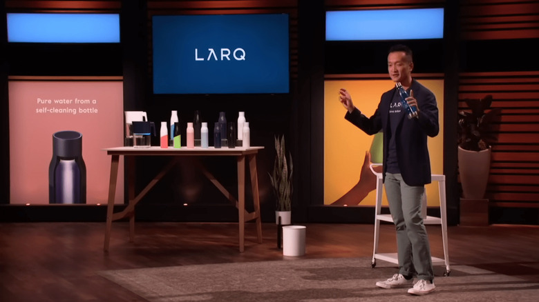 Justin Wang pitches Larq in front of the Larq display