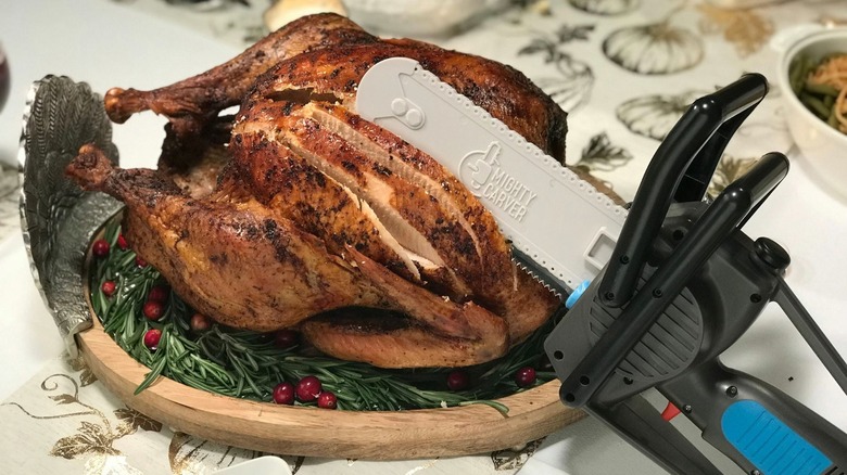 The Mighty Carver cutting turkey