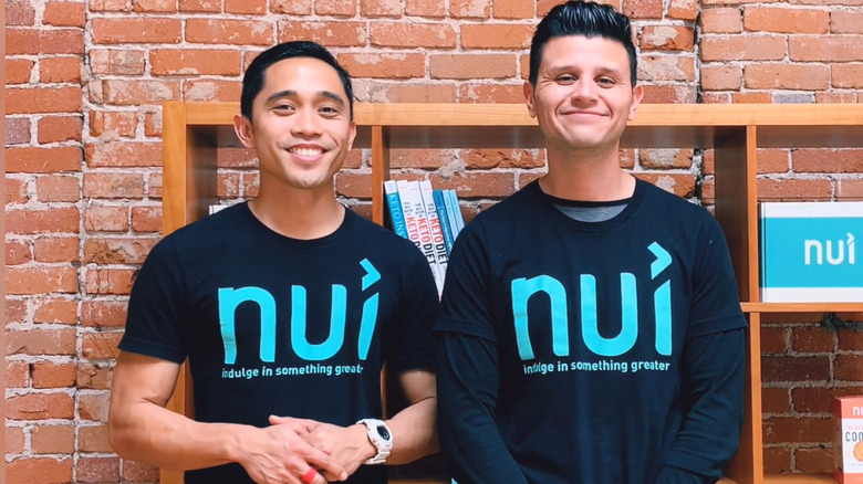 smiling Nui founders standing together