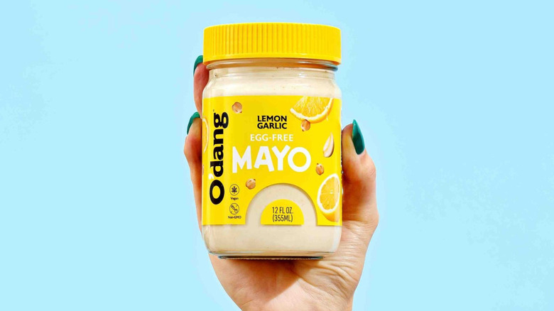 Hand holding O'Dang mayo