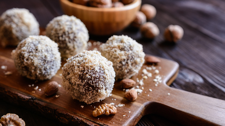 ball-shaped chocolate treats on a cutting board