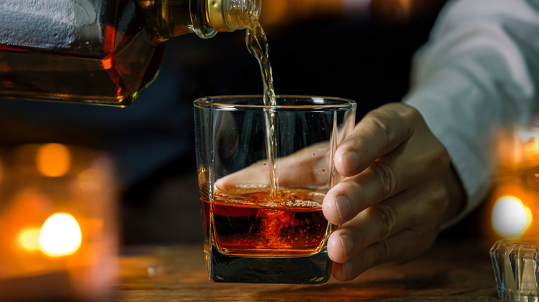 Whiskey poured into glass
