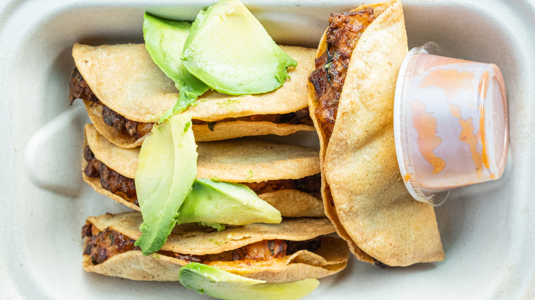 Deep-fried shrimp tacos to go