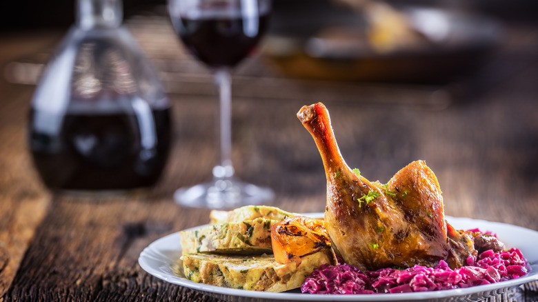 Duck confit plate with wine