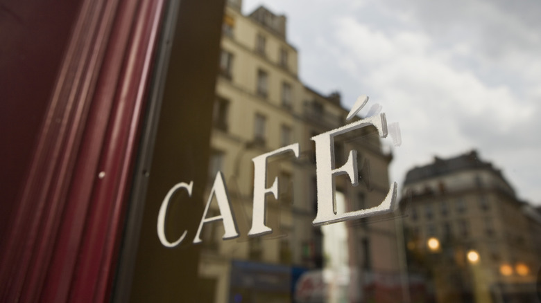 window with "cafe" sign