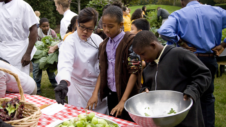 Comerford directs children in the White House garden
