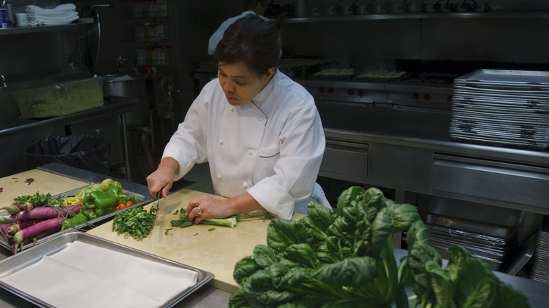 Comerford preparing vegetables in White House kitchen