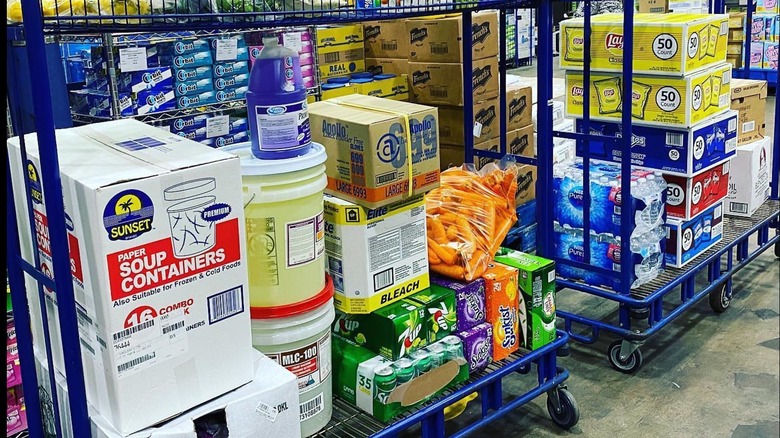 Products on blue carts in restaurant depot