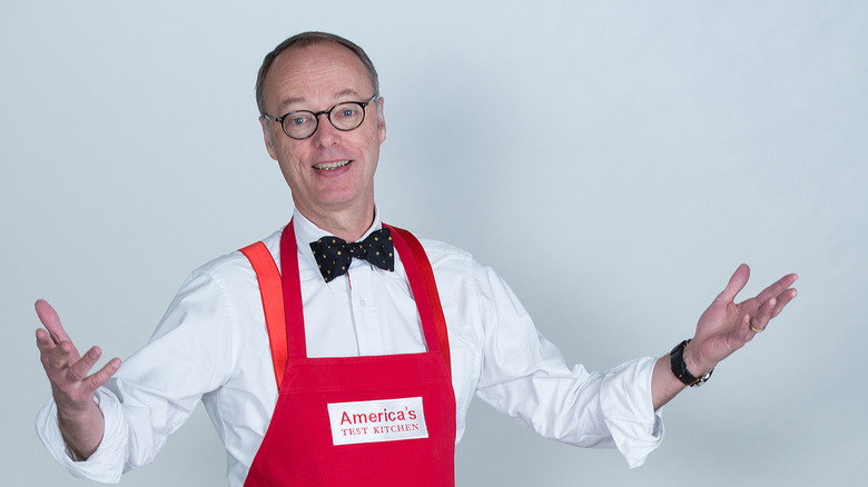Christopher Kimball with bow tie and crimson apron