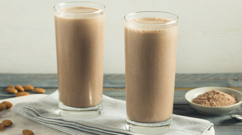 Two chocolate smoothies with almonds
