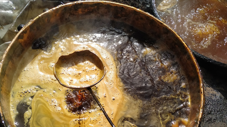 molasses boiling in a fire