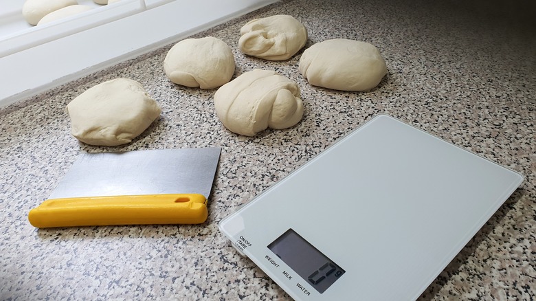 Pizza dough balls with scale