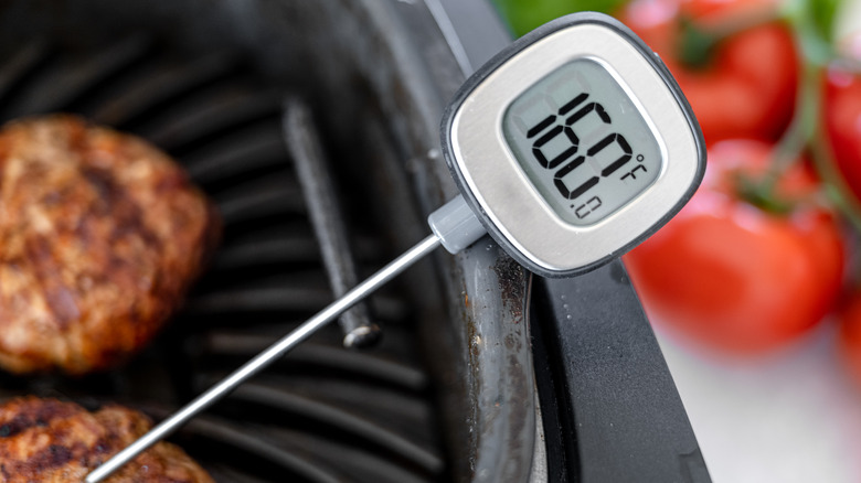 food thermometer in burgers
