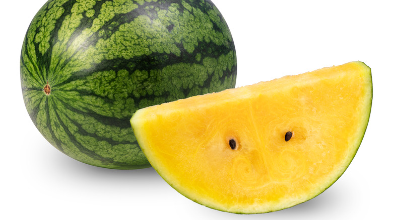 Yellow watermelon cut in half