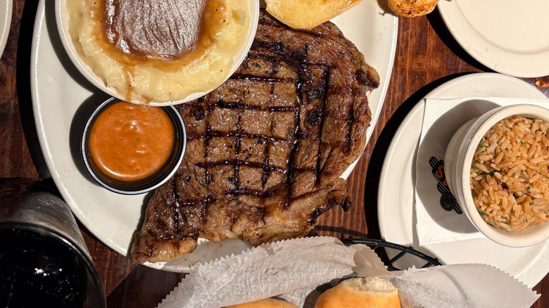Texas roadhouse steak dinner with sides