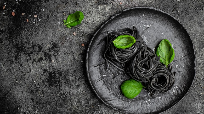 Why Bobby Flay Loves Adding Squid Ink To His Pasta Dough