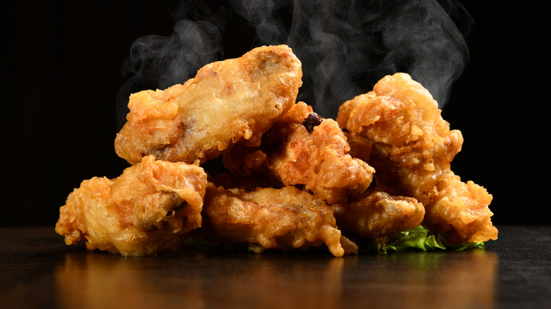 steaming fried chicken wings