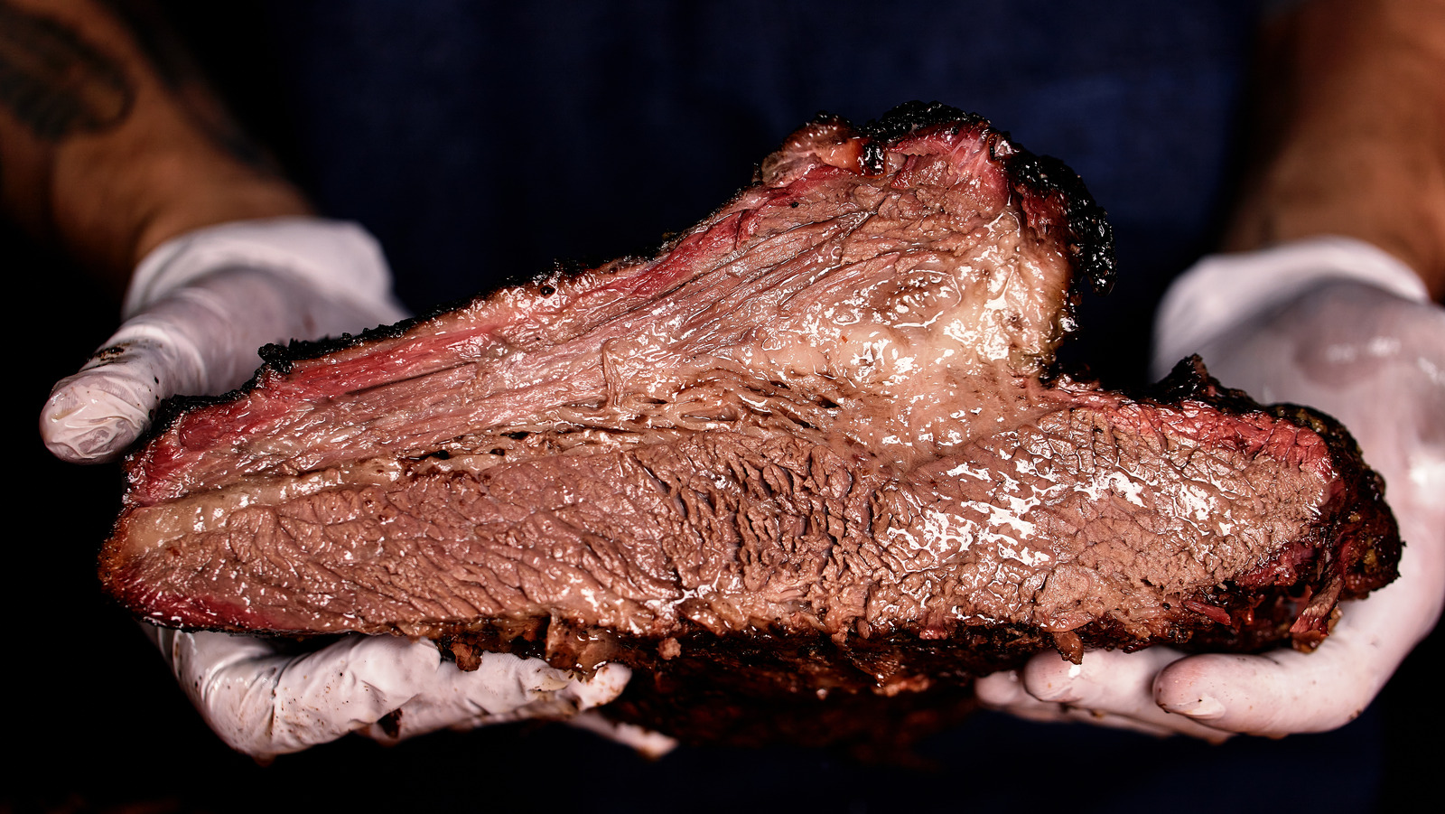 Why Brisket Is The Ultimate Challenge When It Comes To Smoking Meat