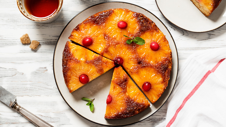 Pineapple upside-down cake with slice removed