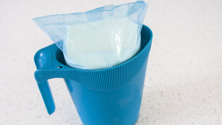 Bagged milk in a pitcher
