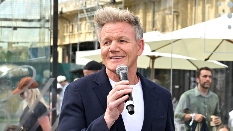 Gordon Ramsay speaking into a mic