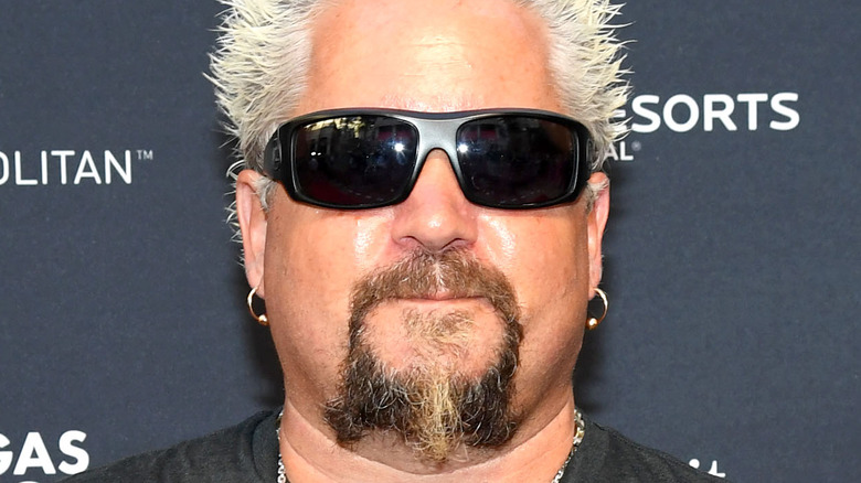 Guy Fieri smirking