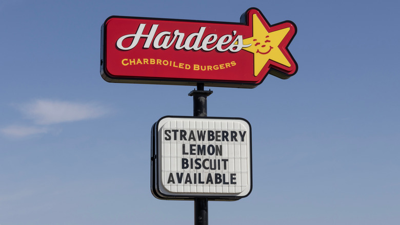 Hardee's sign, with "Strawberry Lemon Biscuit Available" written underneath it