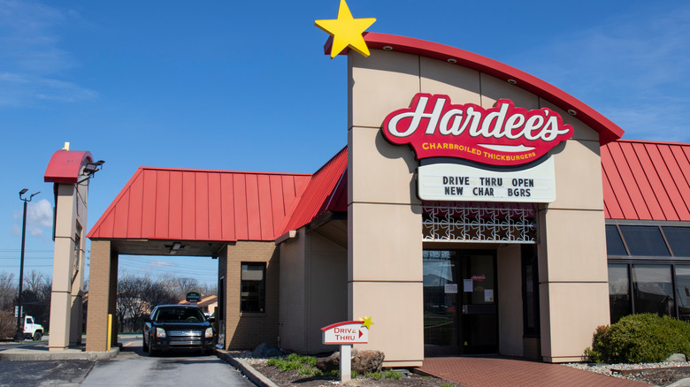 Hardee's store exterior, with a drive-thru next to it