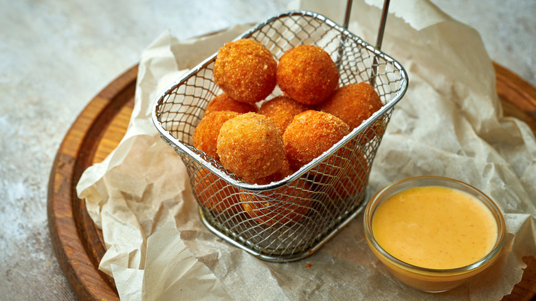 Fried mac and cheese balls with dipping sauce