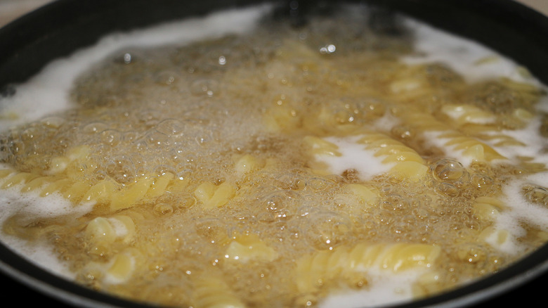 Overhead view of starchy pasta water