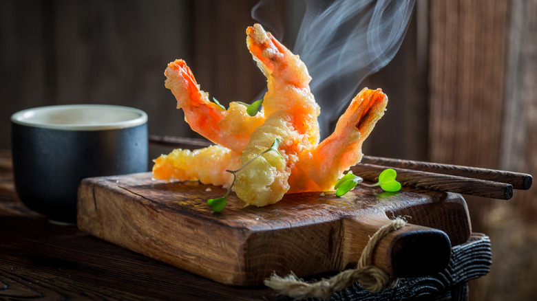 Shrimp tempura plated on block