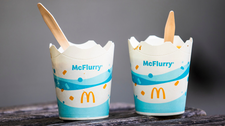 Two McFlurries with spoons sticking out