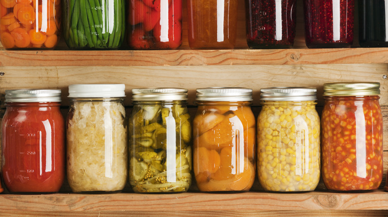 pickled vegetables in jars on shelf