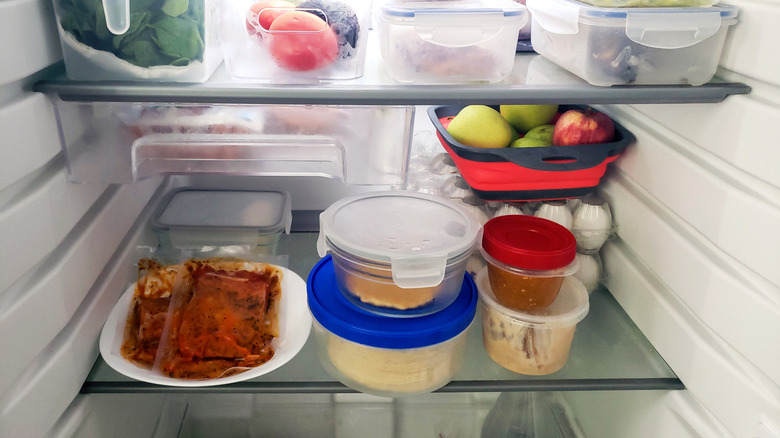 Assorted food containers in the refrigerator