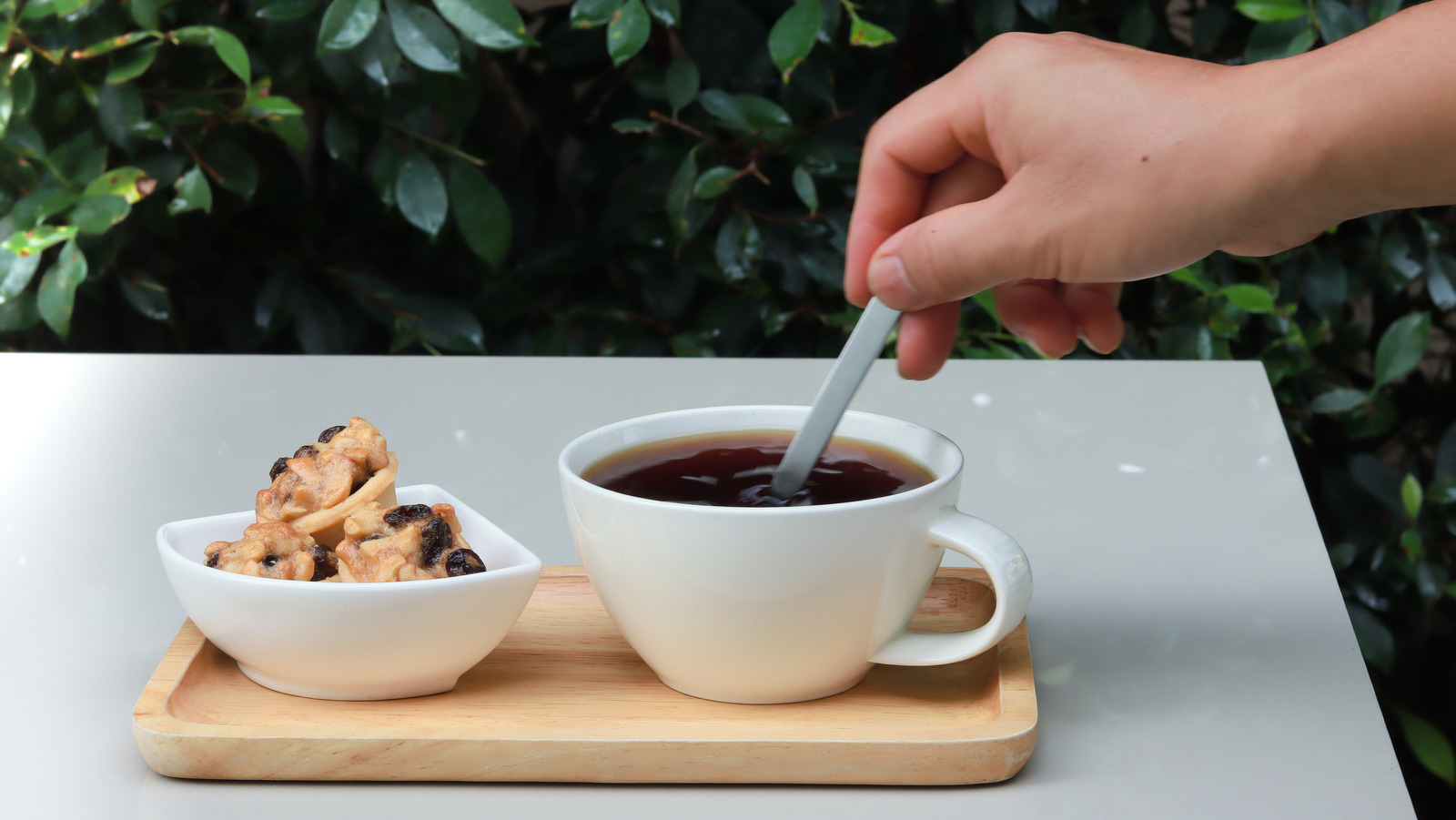 Why Stirring Hot Coffee Is Pointless If You're Waiting For It To Cool Down