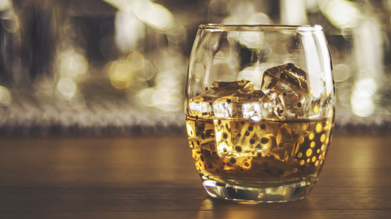 close-up of a tumbler of whiskey