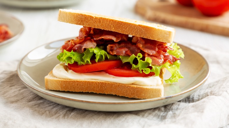 BLT with untoasted bread on plate