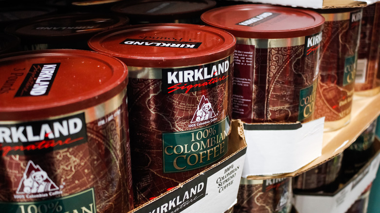 Tins of Kirkland brand Costco ground coffee on shelves