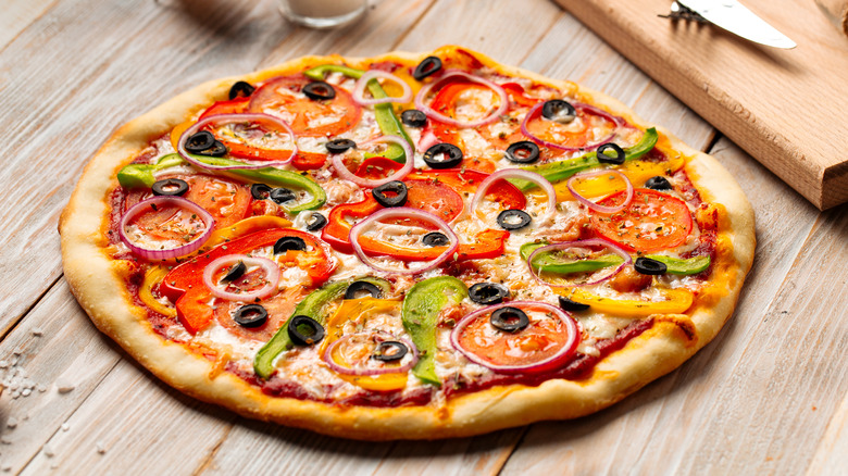 Pizza with vegetable toppings