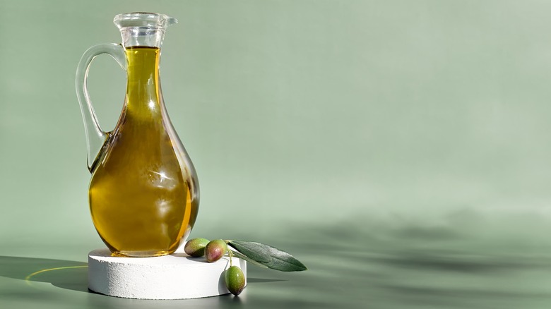 olive oil in a clear glass bottle