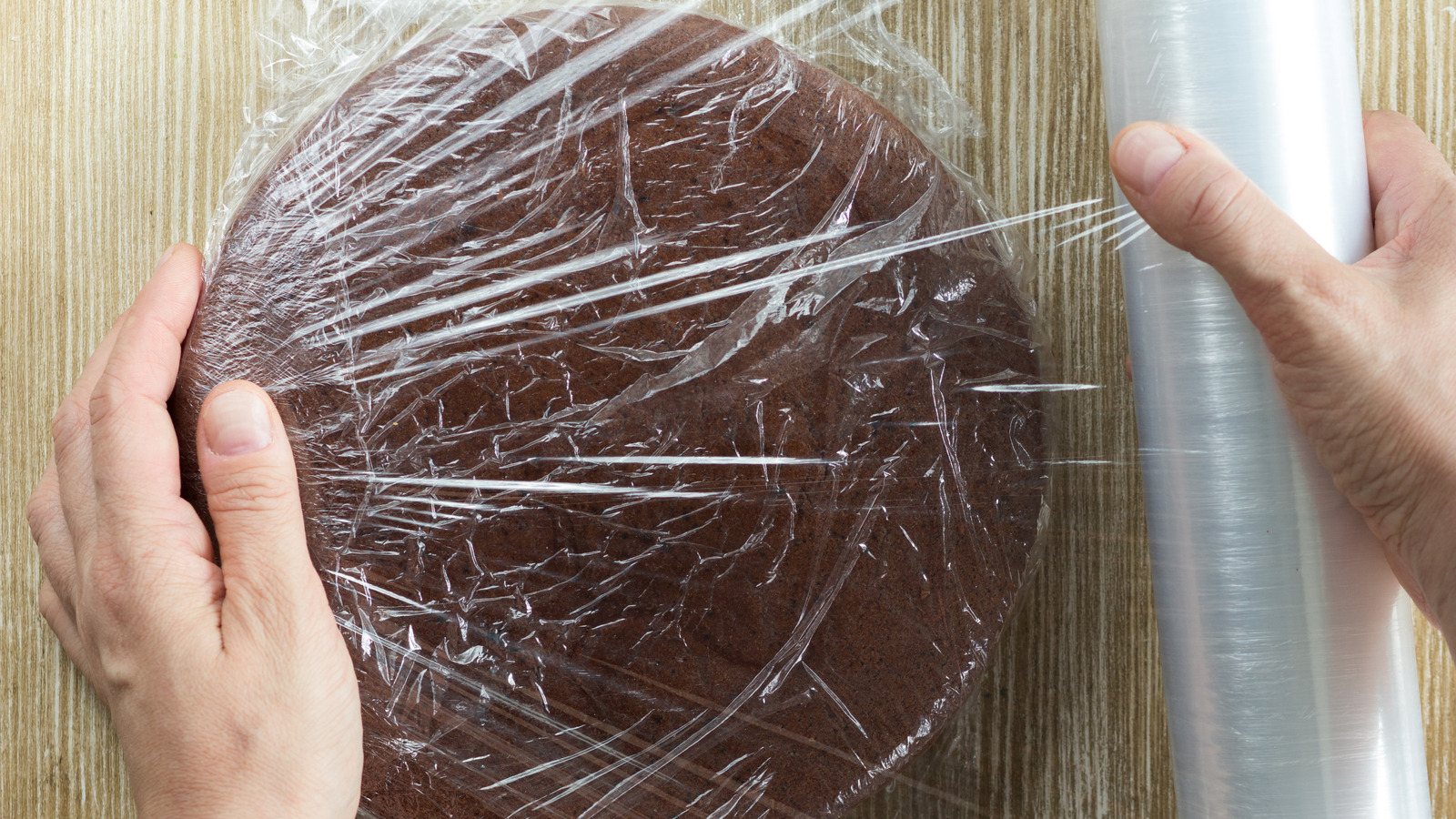 Why You Should Cover Your Cake In Plastic Wrap Fresh Out Of The Oven