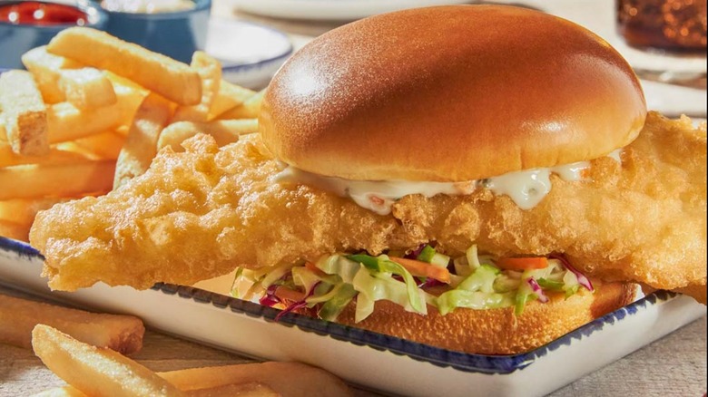Red Lobster fish sandwich on plate with fries