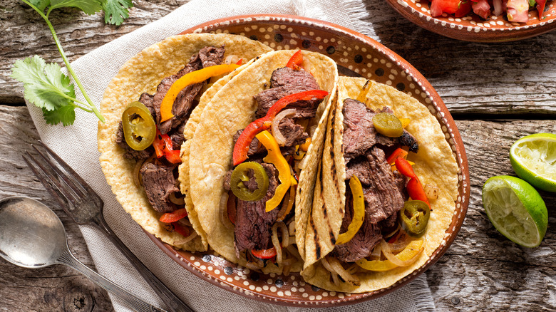 warmed tortillas with beef and peppers