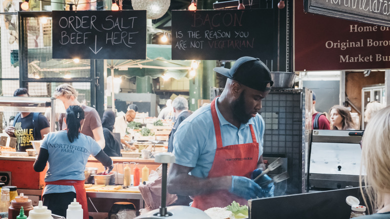 Butcher at an open air market