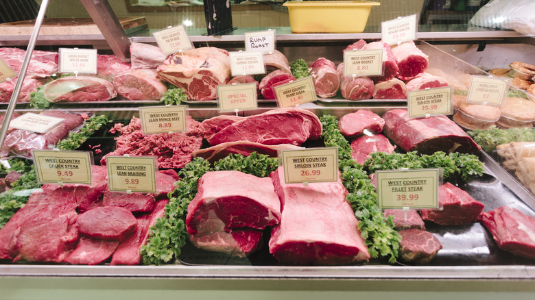 Meat counter with signs