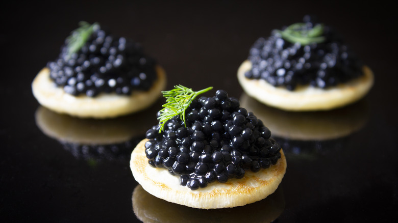 Caviar on blinis 