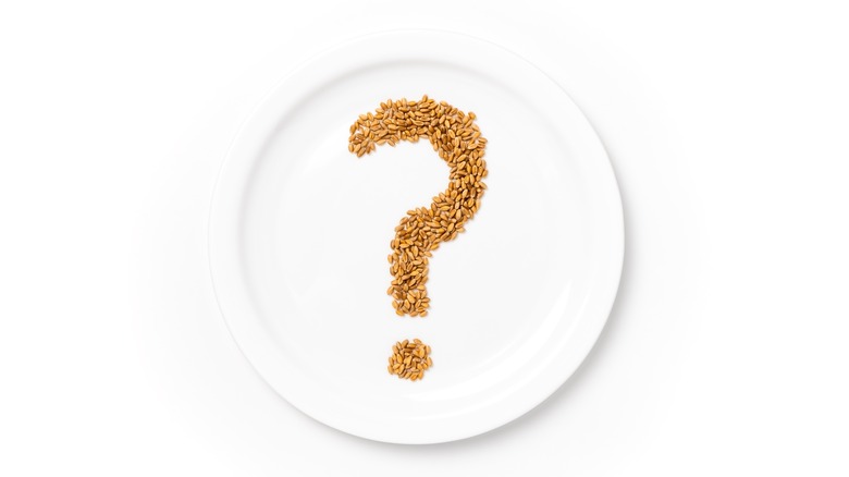 Grains on plate arranged into question mark shape