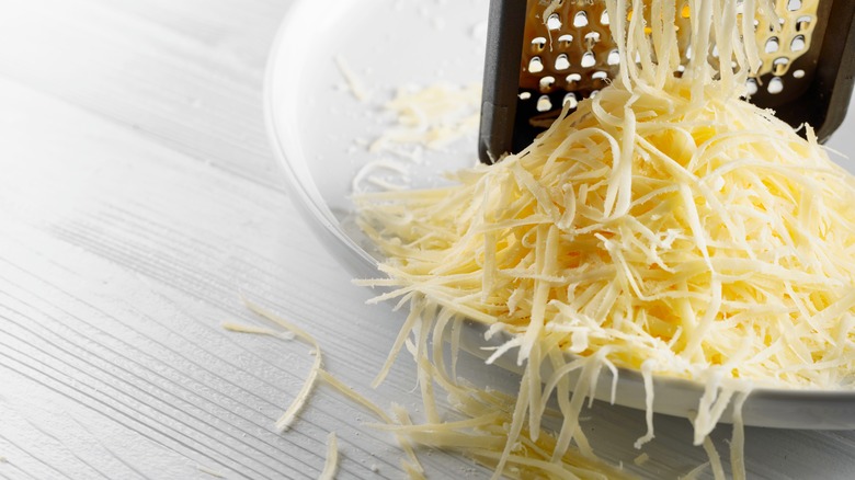 Grated cheese on plate 