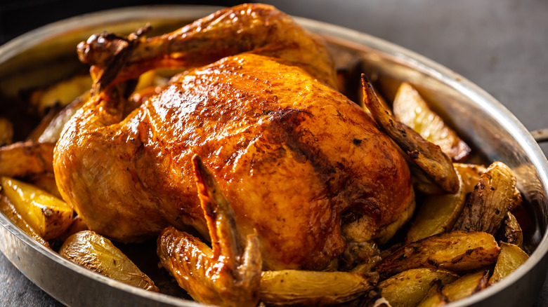Whole roasted chicken and potatoes