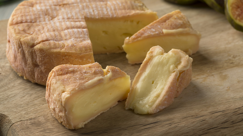 Munster cheese on cutting board